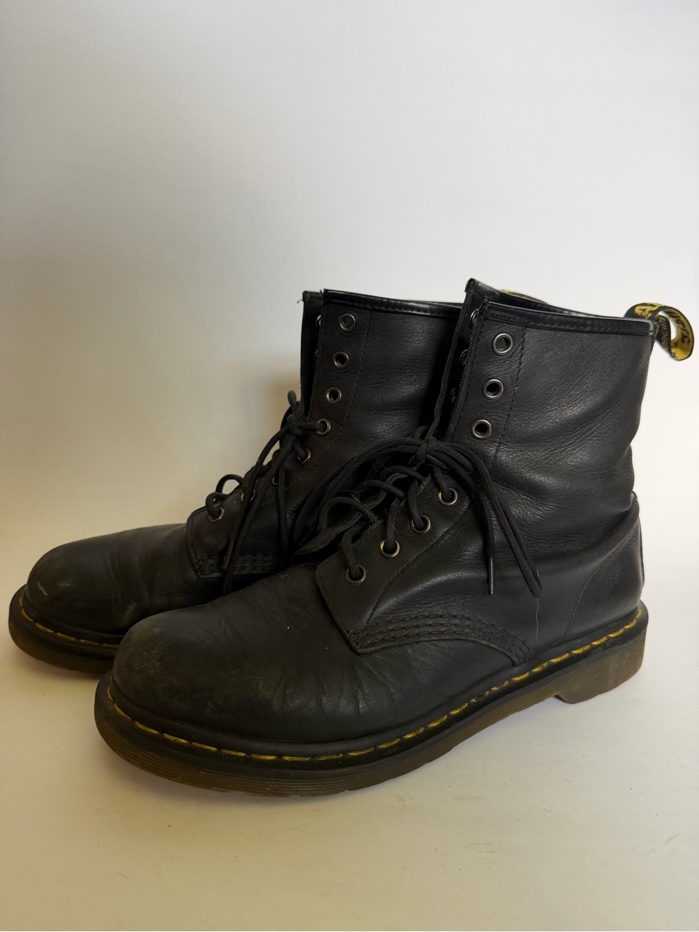 Dr. Martens Black Leather 8‑Eye Lace Boots with Yellow Stitching